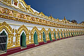 Myanmar - Sagaing hill, Umin Thounzeh (the 30 Caves), a colourful crescent-shaped colonnade within which there are 45 Buddha images. 